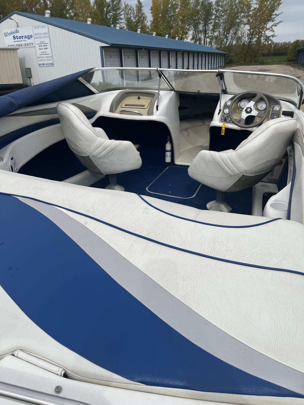 1999 Larson 206 SEi Runabout, 5.0L Volvo Penta I/O, ShoreLand'r Roller Trailer, $4,900