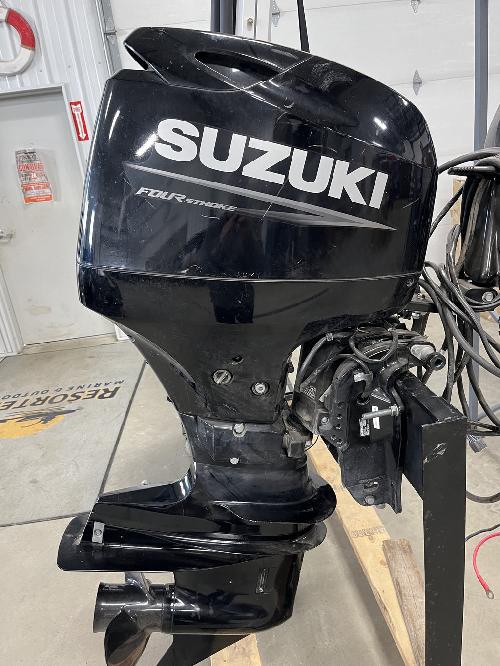 2022 Suzuki 60 HP 4-Stroke Outboard Motor (Tiller or Remote, 68 Hours), $5,900