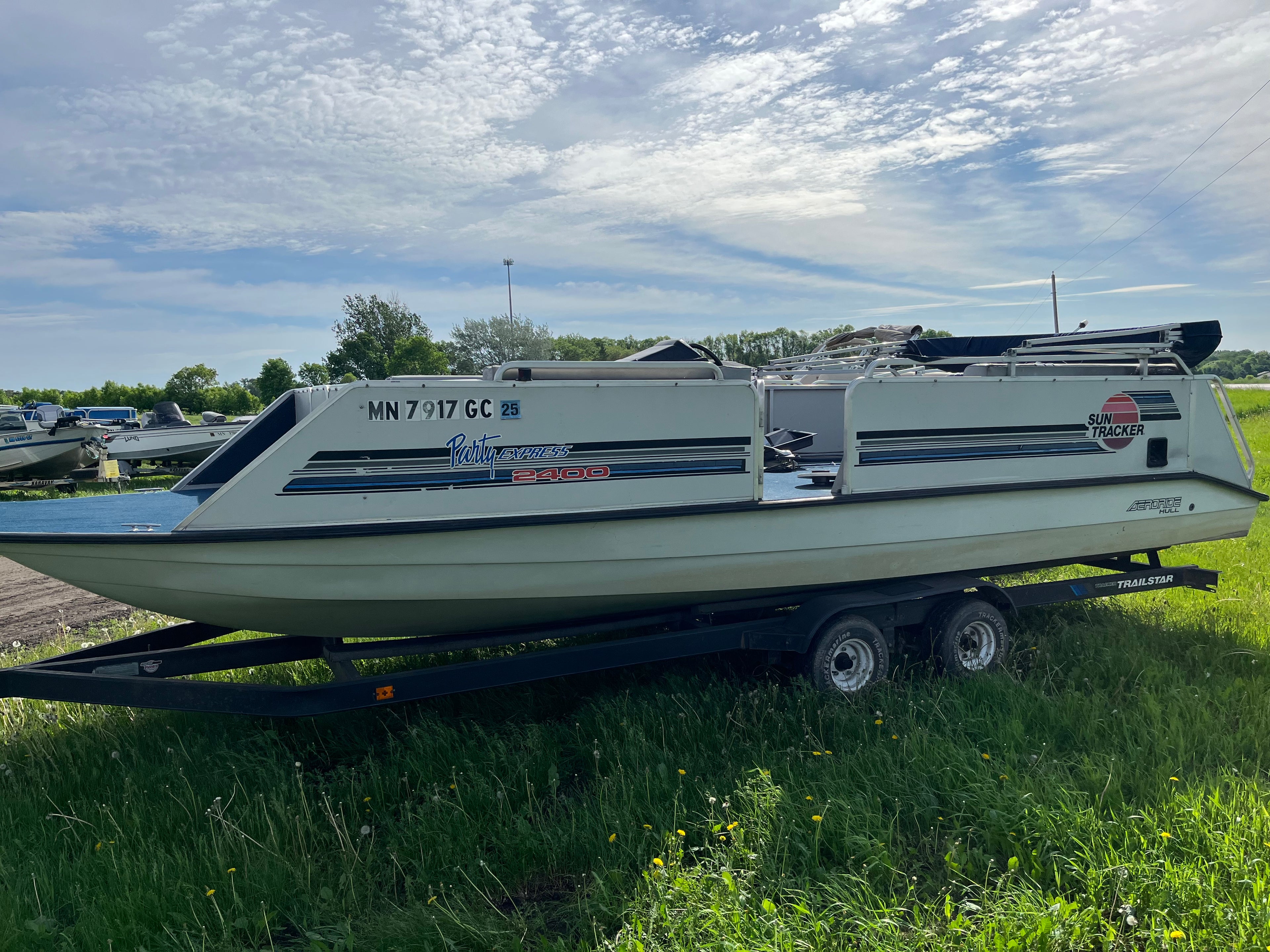 1992 Tracker 24' Deck Boat with 2005 Mercury 150 EFI – One Owner – Includes Bunk Trailer