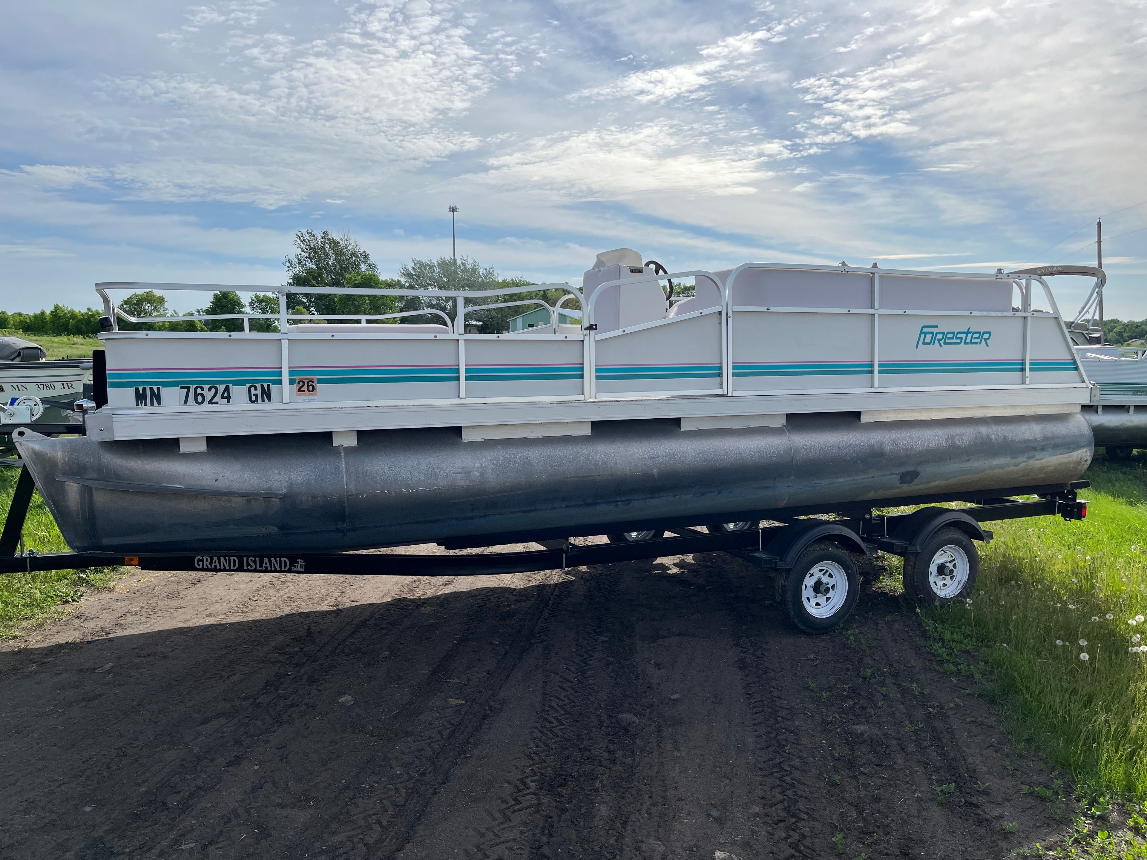 1994 Forester 20' Pontoon with 2003 Evinrude 40HP – New Dual Axle Trailer
