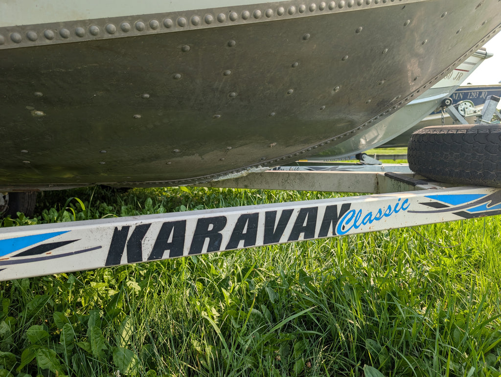 1995 Tracker Pro Deep 16 Deep-V Fishing Boat w/ 60HP Mercury 2-Stroke & Karavan Roller Trailer