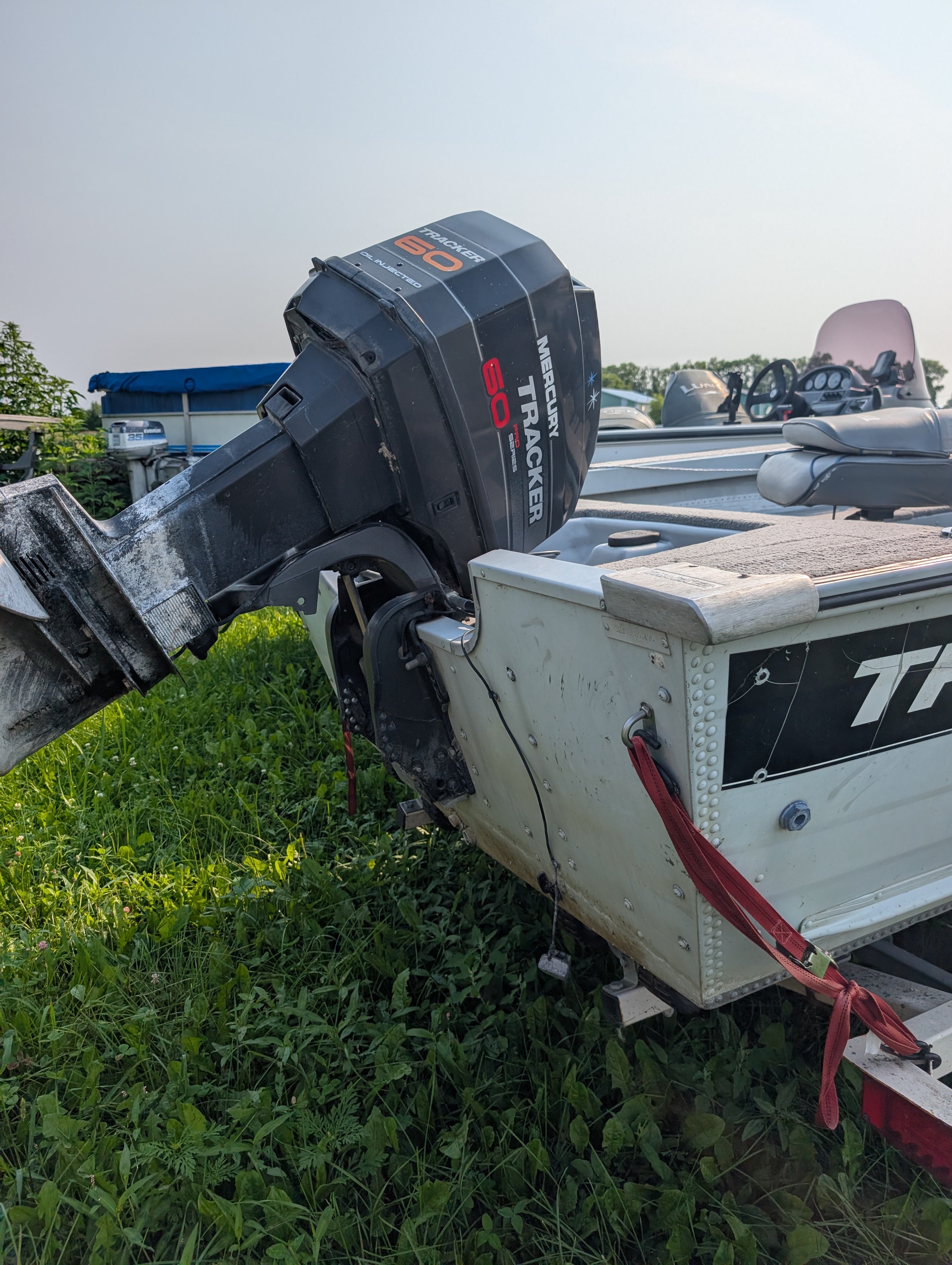 1995 Tracker Pro Deep 16 Deep-V Fishing Boat w/ 60HP Mercury 2-Stroke & Karavan Roller Trailer